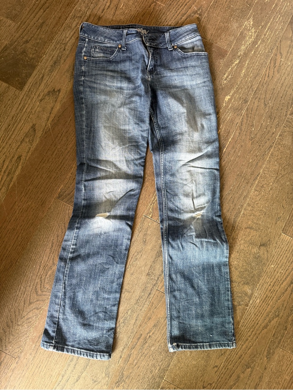 Wrangler Faded Blue Straight-Leg Jeans with Light Distressing